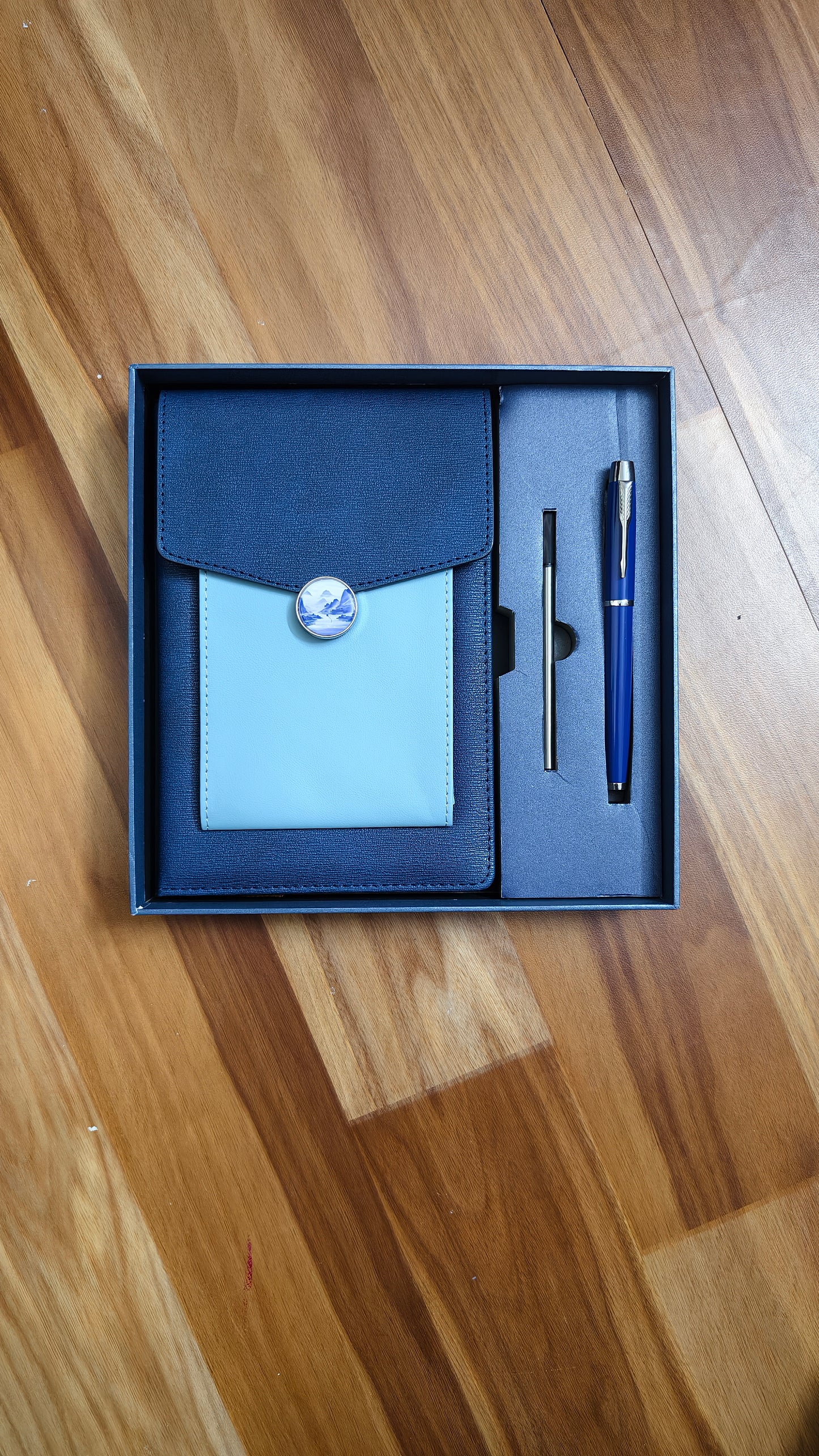 3 in 1 Gift Set Blue PU Leather A5 Notebook with decorative moon button closure, a matching ballpoint pen, and a pen refill
